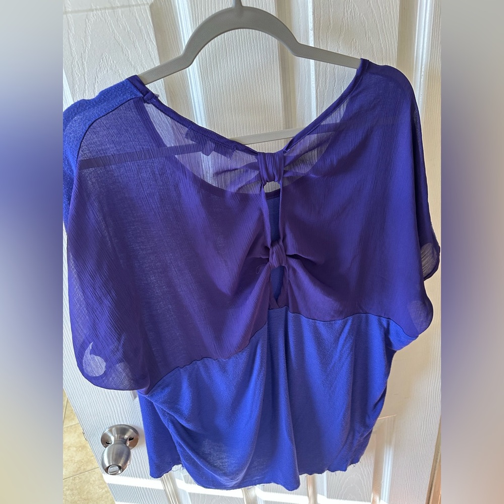 Open back with bow tie detailing blouse